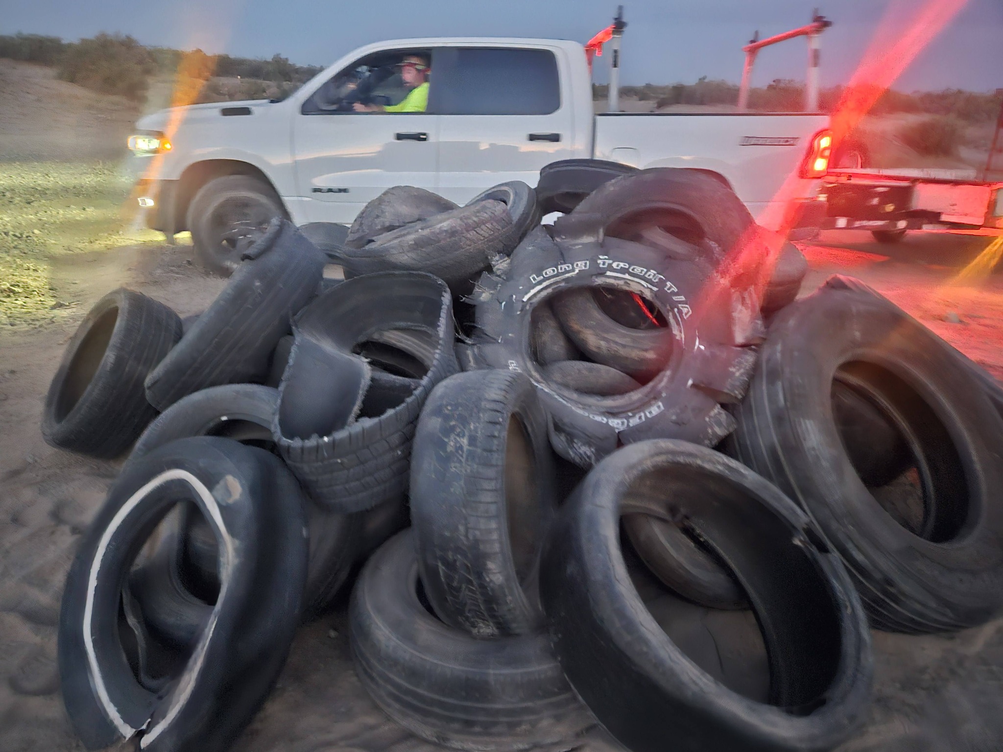 A large pile of tires removed from the riverbank